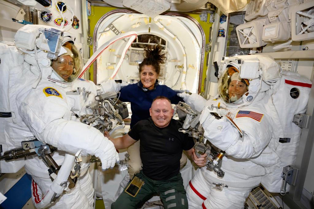 NASA astronaut conducting maintenance on the ISS