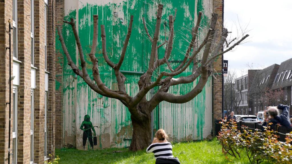 Banksy mural depicts a girl reaching for a balloon