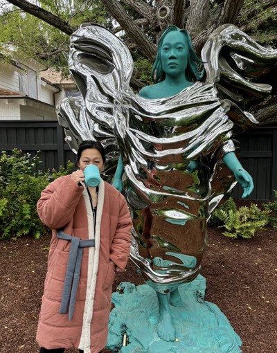 Mark Zuckerberg and the statue of Priscilla Chan