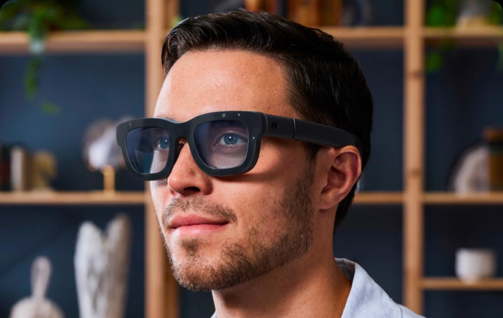 User wearing Meta's Orion AR Glasses